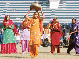 Girls perform during the closing ceremony of the Punjab State Primary Schools Games in Ludhiana on Friday