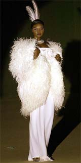 A model displays a creation from the 2004-2005 winter couture collection by Turkish designer Yildirim Mayruk during a fashion show named Fables to 2023-XI in Istanbul