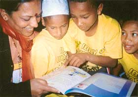 School children in Cape-Town, South Africa, enjoy their story-reading session with Vijay Lakshmi Nagraj.