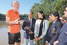 Ambassador of Royal Netherlands to India Eric F. Ch. Niehe gives tips to young rowers at the Sukhna rowing course in Chandigarh