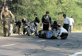 A scooterist met an accident after his vehicle got entangled in electric wires, which were lying on the road near Buddha Garden in the Capital