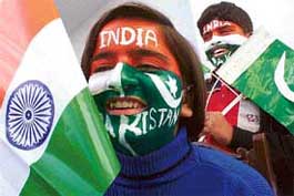 Children of Modern Senior Secondary School paint their faces with the colours of the national flags of India and Pakistan at the opening ceremony of the first Indo-Pak Punjab Games at Yadavindra Public Stadium in Patiala on Sunday.