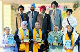 Recipiants of Sirjandhara awards during a felicitation function in Ludhiana on Sunday