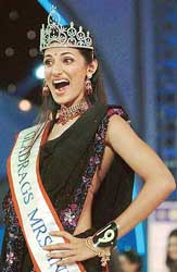 The winner of the Mrs India 2004 Contest Shilpa Reddy reacts on being crowned in the finals in Mumbai on Saturday night.