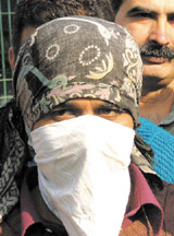 Rajesh, alias Mogli, a member of Kishan Pahalwan gang, arrested by the Crime Branch, Delhi Police, in the Capital
