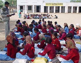 Classes being held in the open at Government Primary School, Tikri (Kurukshetra), on Friday, owing to a shortage of rooms