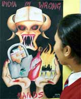 A student has a look at posters at an exhibition at DAV Public School in Ludhiana on Monday