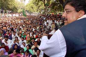 INLD Secretary-General Ajay Singh Chautala addresses demonstrators outside Parliament House in New Delhi on Monday.