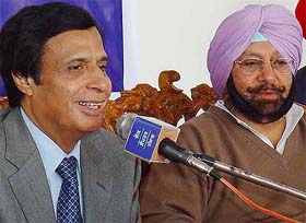 Mr Pervaiz Elahi is all smiles as he answers questions at a joint Press Conference with Capt Amarinder Singh in Chandigarh