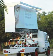 A truck carrying an advertisement in violation of rules.