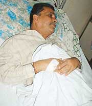 Mr Mukesh Nayyar, alleged victim of police torture, in DMC hospital in Ludhiana. 
