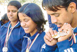 Students of the Institute for the Blind, Sector 26, Chandigarh, in a jubilant mood after bagging five golds, three silver and two bronze medals in the National Sports Meet for the visually handicapped in New Delhi.