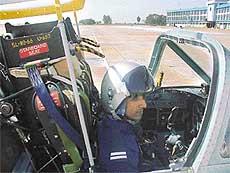 A cadet strapped up and ready to go in a Kiran jet trainer at the Air Force Academy in Dundigal.