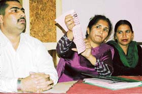 Ms Rajwant Randhawa, president of the DMCH Employees Union, addresses a press conference in Ludhiana