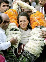 Congress President Sonia Gandhi with supporters at her residence in New Delhi on Thursday. Hundreds of her supporters turned up at her residence for her 58th birthday.