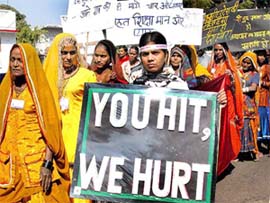 Women activists from various NGOs take out a silent march on the occasion of World Human Rights Day in Bhopal on Friday. 