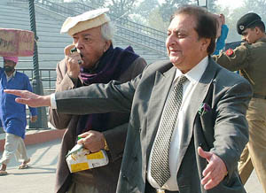 Mr Fakhar Zaman, Chairman of the World Punjabi Conference, arrives at the Wagah check post as part of a Pakistani delegation on Friday. 