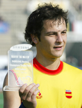Spanish forward Rodrigo Garza holds the man-of-the-match award after his teams match against Pakistan in the Champions Trophy Hockey Tournament at Lahore on Friday.