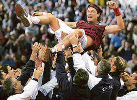 On top of the World: Carlos Moya guided Spain to their second Davis Cup win in four years.