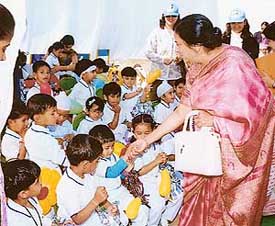 The chief guest, Ms Manjit Kalra, interacts with children of Rai School, Sector 48, Chandigarh, 
