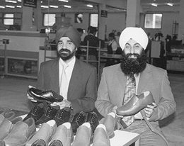 Directors of M and B Footwear ( P) Ltd Ajinder Singh and Mr Inder Dev Singh Musafir with their product at the Baddi unit on Monday.