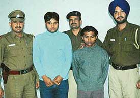 Khem Karan and Prashant in police custody in Chandigarh on Monday. 