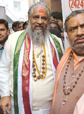 Chandraswami appears in Patiala House court in New Delhi on Monday.
