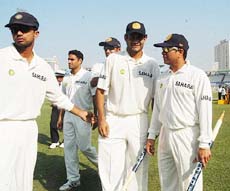 Vice-captain Rahul Dravid, paceman Irfan Pathan and Sachin Tendulkar after India won the first Test at Dhaka on Monday.