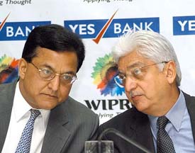 Wipro Chairman Azim Premji  having a word with Rana Kapoor, chief technology officer & managing director