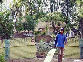 Repair work in progress at the official residence of the Deputy Commissioner in Hamirpur on Tuesday.