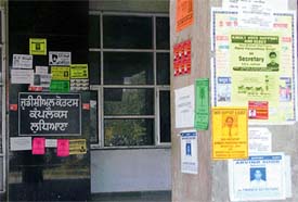 Posters pasted by bar candidates defacing public property