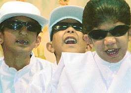 Visually-impaired children sing a song to mark the 150th birth anniversary of Holi Mother Sri Sharada Devi at Ramakrishna Paramhans Ashram in Sector-15, Chandigarh, on Wednesday. 