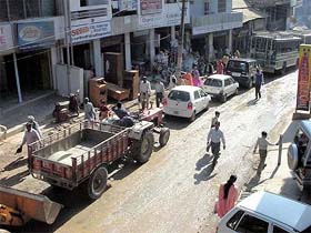 Vehicles line up in Hamirpur town on Thursday after a truck got trapped in a ditch