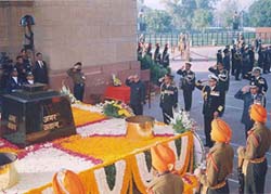 Defence Minister Pranab Mukherjee with the three services chiefs pays homage to martyrs at Amar Jawan Jyoti at India Gate on the occasion of Vijay Divas in New Delhi on Thursday.