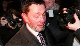 Britain's David Blunkett arrives at his home following his resignation