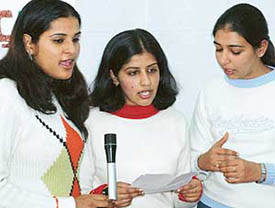 Girls take part in a French singing competition at the Department of French, Panjab University, Chandigarh, on Friday.