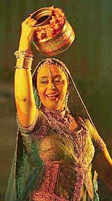 Indian folk singer Ila Arun performing at a charity show