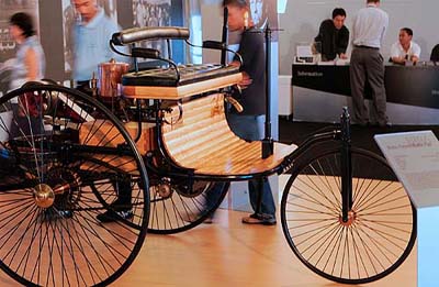 Malaysians look at the worlds first automobile, the Benz Patent Motor Car 1886, at the Mercedes-Benz The Shining Silver Star Classic Car Exhibition in Kuala Lumpur on Sunday. The worlds first automobile was based on a holistic concept where vehicle and engine formed a well-matched, organic entity.