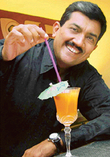 Master chef Sanjeev Kapoor strikes a pose at his restaurant, Yellow Chilli, in Panchkula on Sunday. 