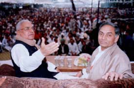 Mr Bhajan Lal and Mr Janardhan Dwivedi, AICC general secretary and incharge, Haryana affairs, at a Congress rally in Sirsa