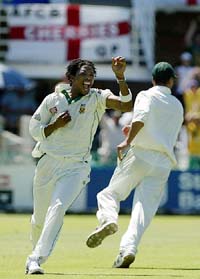 South African bowler Makhaya Ntini celebrates the dismissal of England batsman Geraint Jones