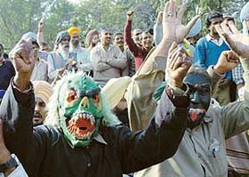 Members of the Co-ordination Committee of the Government and Municipal Corporation Employees and Workers, Chandigarh, hold a protest at Matka Chowk
