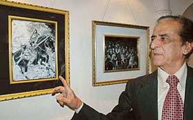 Hargopal Jhamb with his works displayed at IndusInd Art Gallery, Sector 8, Chandigarh