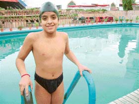 The new swimming champ: Nine-year-old Abhinav