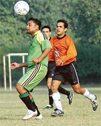 Amritpal of AG, Haryana, controls the ball during their final match against DGACR in the North Zone Audit Football Tournament in Chandigarh