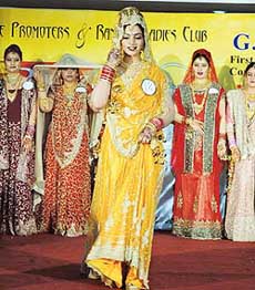 The participants for Mrs Ludhiana 2004 walk on the ramp in Ludhiana on Wednesday. 