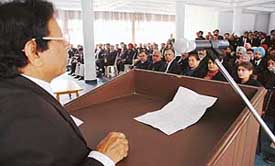 Sessions Judge Harbans Lal addresses lawyers at Ludhiana on Wednesday.