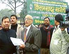 Adviser of the Election Commission, Mr K.J. Rao, inspect hoardings in Patna on Wednesday. 
