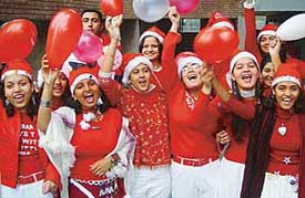 Students of the National Institute of Fashion Design (NIFD), Sector 8, Chandigarh, celebrate Christmas bash at Tagore Theatre, Chandigarh, on Thursday.