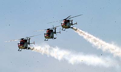 Dhruv helicopters present an arobatic show during a visit by Malaysian Prime Minister Dato `Seri Abdullah Ahmed Badawi at Hindustan Aeronautics in Bangalore on Thursday. 